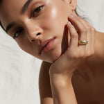 chunky gold dome ring on hand, crystal dome ring, wide gold band ring, statement gold ring, sparkly dome ring, cubic zirconia band ring, thick gold ring, scattered crystal ring, gold stacking ring, bold gold ring, matching ring and earrings, women’s chunky ring