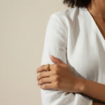 croissant ring on model, twisted ridge gold ring, textured dome ring lifestyle, chunky gold ring styled, 18k gold overlay ring, statement gold ring on hand, ribbed gold band ring, sculptural gold ring outfit