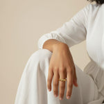 croissant ring on model, twisted ridge gold ring, textured dome ring lifestyle, chunky gold ring styled, 18k gold overlay ring, statement gold ring on hand, ribbed gold band ring, sculptural gold ring outfit
