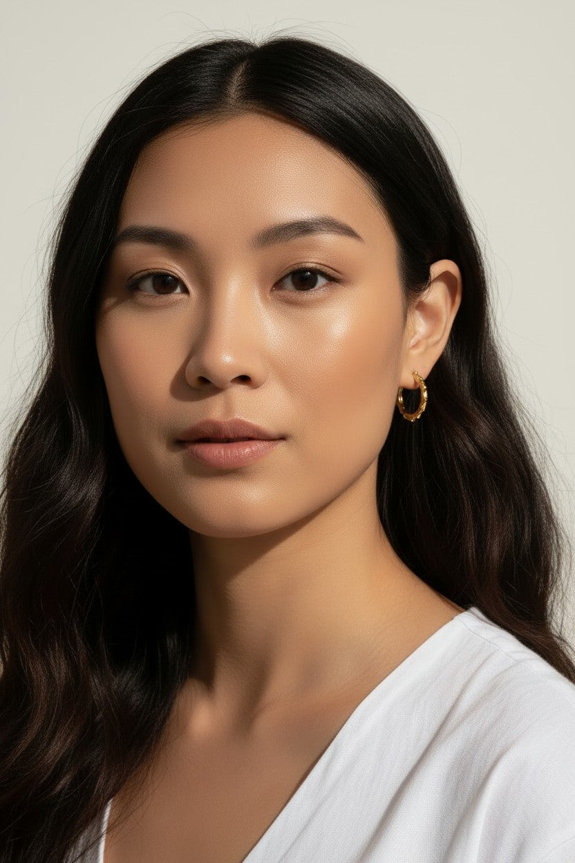 twisted rope hoop earrings, gold twist hoops on-model, 18K gold overlay hoops, small textured hoops, everyday gold hoops, rope texture earrings, dainty hoop earrings, twist hoop jewelry