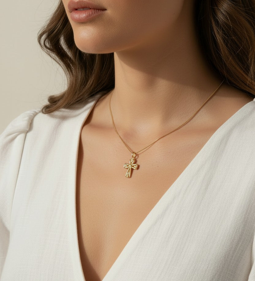 gold ornate cross necklace