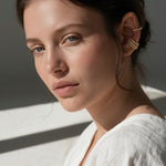 triple band ear cuff, pavé ear cuff, twisted rope ear cuff, gold ear cuff set, no piercing ear cuff, stacked ear cuffs, layered ear jewelry, crystal ear cuff on model