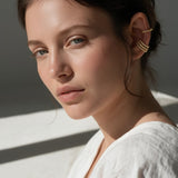 triple band ear cuff, pavé ear cuff, twisted rope ear cuff, gold ear cuff set, no piercing ear cuff, stacked ear cuffs, layered ear jewelry, crystal ear cuff on model