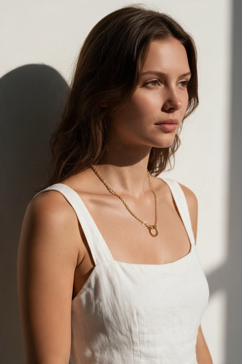 gold rolo chain necklace on model, round clasp necklace, charm holder necklace, spring ring clasp necklace, gold chain with ring clasp, modern gold chain necklace, front clasp necklace, layering chain necklace, everyday gold necklace, minimalist gold necklace, interchangeable pendant necklace, women’s gold chain necklace
