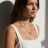 gold rolo chain necklace on model, round clasp necklace, charm holder necklace, spring ring clasp necklace, gold chain with ring clasp, modern gold chain necklace, front clasp necklace, layering chain necklace, everyday gold necklace, minimalist gold necklace, interchangeable pendant necklace, women’s gold chain necklace