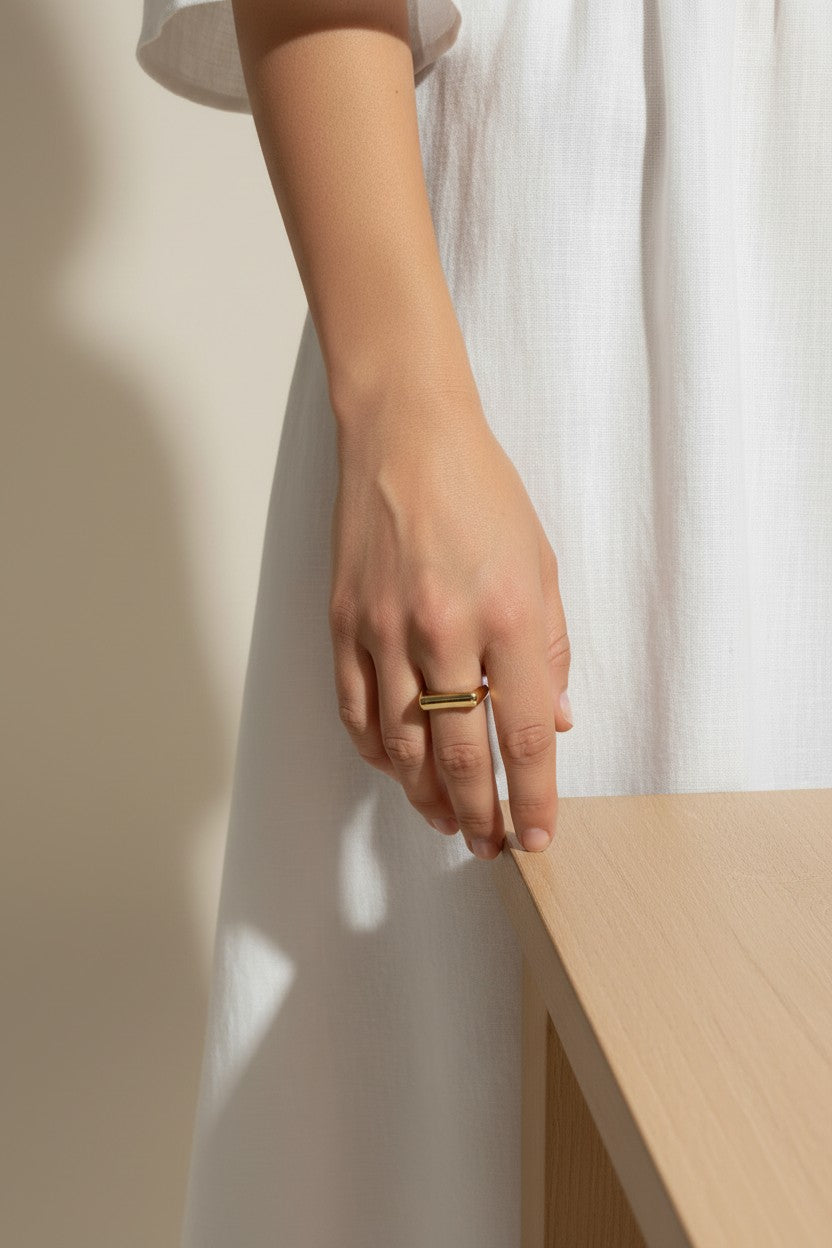 vertical bar ring, gold bar ring on model, minimalist geometric ring, modern stacking ring, architectural gold ring, sleek bar ring styled, everyday gold ring, statement bar ring