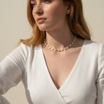 baroque pearl necklace, front toggle clasp necklace, freshwater pearl chain necklace, gold and pearl necklace on model, organic pearl necklace, statement clasp pearl necklace, dainty pearl choker, pearl necklace close-up