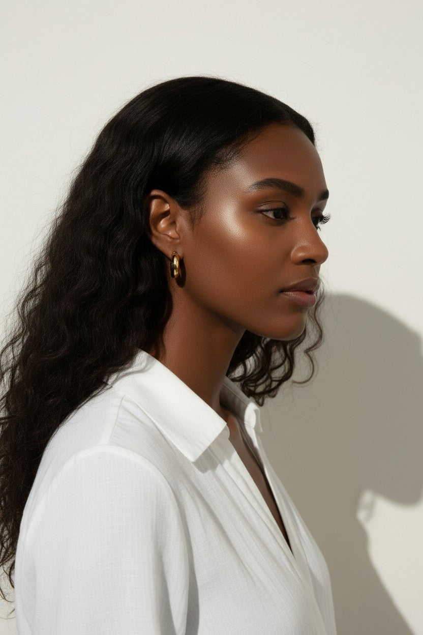 chunky round hoop earrings, gold tube hoop earrings, bold gold hoops on model, small chunky hoops, polished round hoops, statement gold hoops, everyday hoop earrings, thick gold hoop earrings