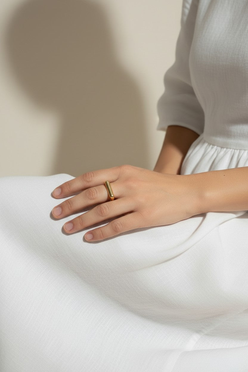 vertical bar ring, gold bar ring on model, minimalist geometric ring, modern stacking ring, architectural gold ring, sleek bar ring styled, everyday gold ring, statement bar ring