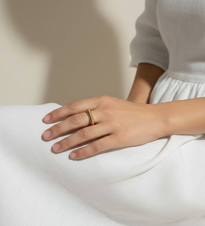 vertical bar ring, gold bar ring on model, minimalist geometric ring, modern stacking ring, architectural gold ring, sleek bar ring styled, everyday gold ring, statement bar ring