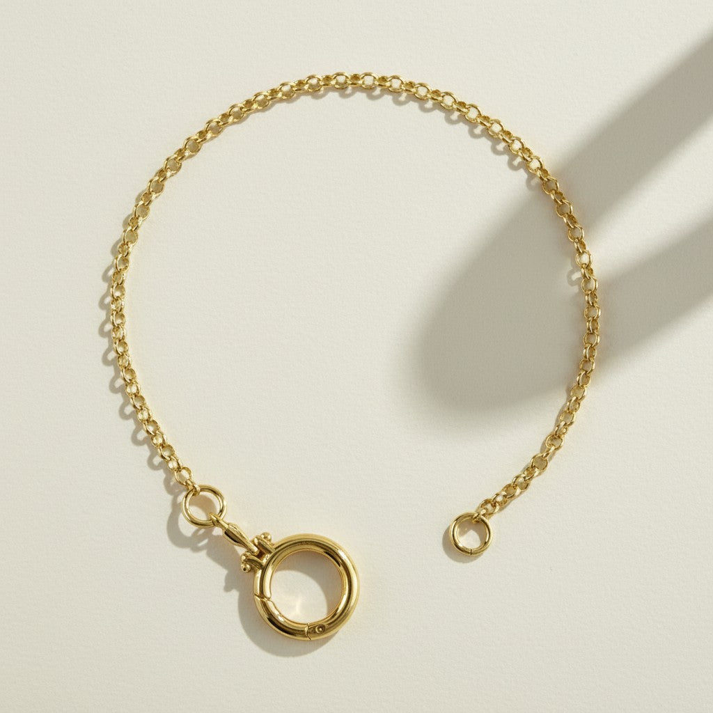 gold rolo chain bracelet, round clasp bracelet, charm holder bracelet, spring ring clasp bracelet, build your own charm bracelet, interchangeable charm bracelet, gold chain bracelet with ring clasp, layering bracelet, minimalist gold bracelet, modern gold chain bracelet, everyday gold bracelet, women’s gold bracelet