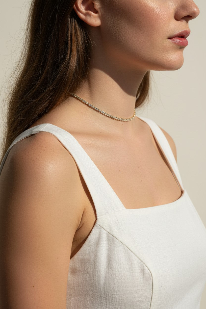CZ tennis choker on model, baguette round cut necklace, sparkly choker close-up, stainless steel tennis necklace, cubic zirconia choker on model, statement choker necklace, layering CZ necklace, glamorous choker photo