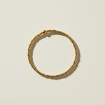 gold beaded stretch bracelet, gold bead bracelet, stretch bracelet gold, minimalist beaded bracelet, stackable gold bracelet, dainty gold bead bracelet, no clasp bracelet, layering bracelet flat lay