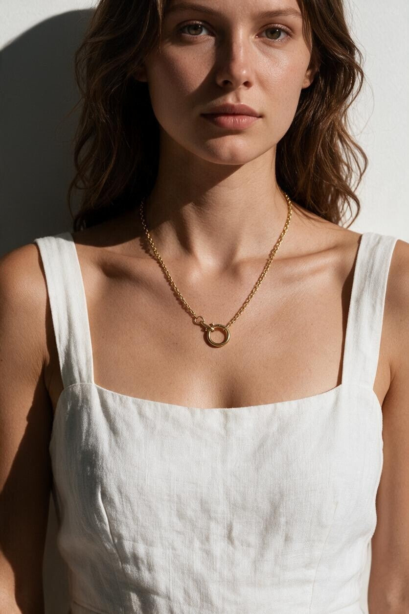 gold rolo chain necklace on model, round clasp necklace, charm holder necklace, spring ring clasp necklace, gold chain with ring clasp, modern gold chain necklace, front clasp necklace, layering chain necklace, everyday gold necklace, minimalist gold necklace, interchangeable pendant necklace, women’s gold chain necklace