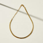 gold herringbone necklace, flat herringbone chain, gold snake chain necklace, adjustable herringbone necklace, shiny gold chain choker, lobster clasp necklace with extender, flat gold chain, layering necklace, everyday gold necklace, collarbone chain necklace, women’s gold chain, timeless gold jewelry