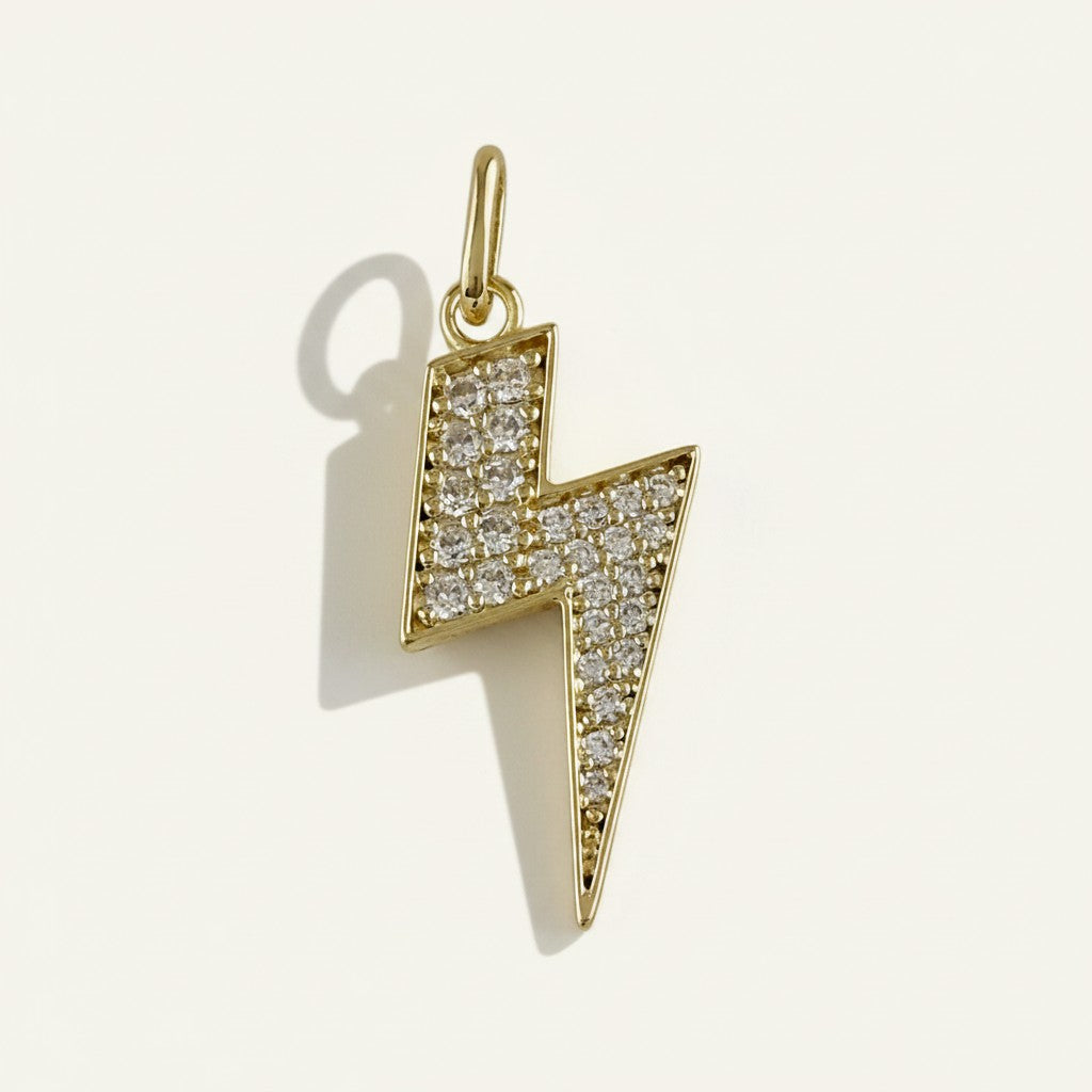 lightning bolt necklace, pave crystal pendant, gold lightning bolt charm, figaro chain necklace, statement pendant necklace, crystal bolt necklace, edgy gold jewelry, lightning pendant on-model