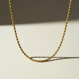 gold rope chain necklace, twisted rope chain, classic gold chain, unisex gold necklace, lobster clasp chain necklace, everyday gold chain, layering chain necklace, gold chain for pendants, medium rope chain, timeless gold jewelry, men’s gold chain, women’s gold chain