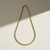 gold rope chain necklace, twisted rope chain, classic gold chain, unisex gold necklace, lobster clasp chain necklace, everyday gold chain, layering chain necklace, gold chain for pendants, medium rope chain, timeless gold jewelry, men’s gold chain, women’s gold chain