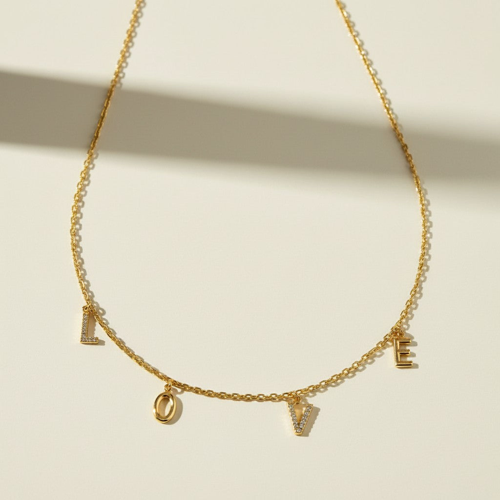 love necklace, letter charm necklace, dangling love pendant necklace, pavé letter necklace, gold love charm necklace, sentimental jewelry, word necklace, cubic zirconia letter necklace
