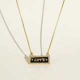 gold LOVE necklace, LOVE bar necklace, engraved bar pendant necklace, gold nameplate necklace, cubic zirconia pavé pendant, box chain necklace, heart extender chain necklace, adjustable gold necklace, word necklace, anniversary gift necklace, Valentine's Day jewelry, gift for her, romantic gold jewelry, dainty gold pendant