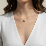 single pearl necklace, pearl pendant necklace, gold chain pearl necklace, minimalist pearl jewelry, classic pearl necklace, everyday pearl necklace, floating pearl necklace, on-model necklace photography