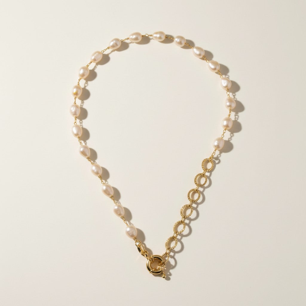 baroque pearl necklace flat lay, asymmetric pearl chain necklace, freshwater pearl necklace with statement clasp, gold link and pearl necklace, textured chain necklace detail, oversized clasp necklace, pearl necklace construction detail, mixed chain pearl necklace