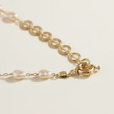 baroque pearl necklace, front toggle clasp necklace, freshwater pearl chain necklace, gold and pearl necklace on model, organic pearl necklace, statement clasp pearl necklace, dainty pearl choker, pearl necklace close-up