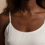gold paperclip chain necklace, crystal station necklace on model, dangling crystal choker, bezel crystal necklace, gold-tone choker necklace, dainty gold necklace, sparkle chain necklace, collarbone necklace, layering necklace, bridal party necklace, everyday gold necklace, gift for her jewelry