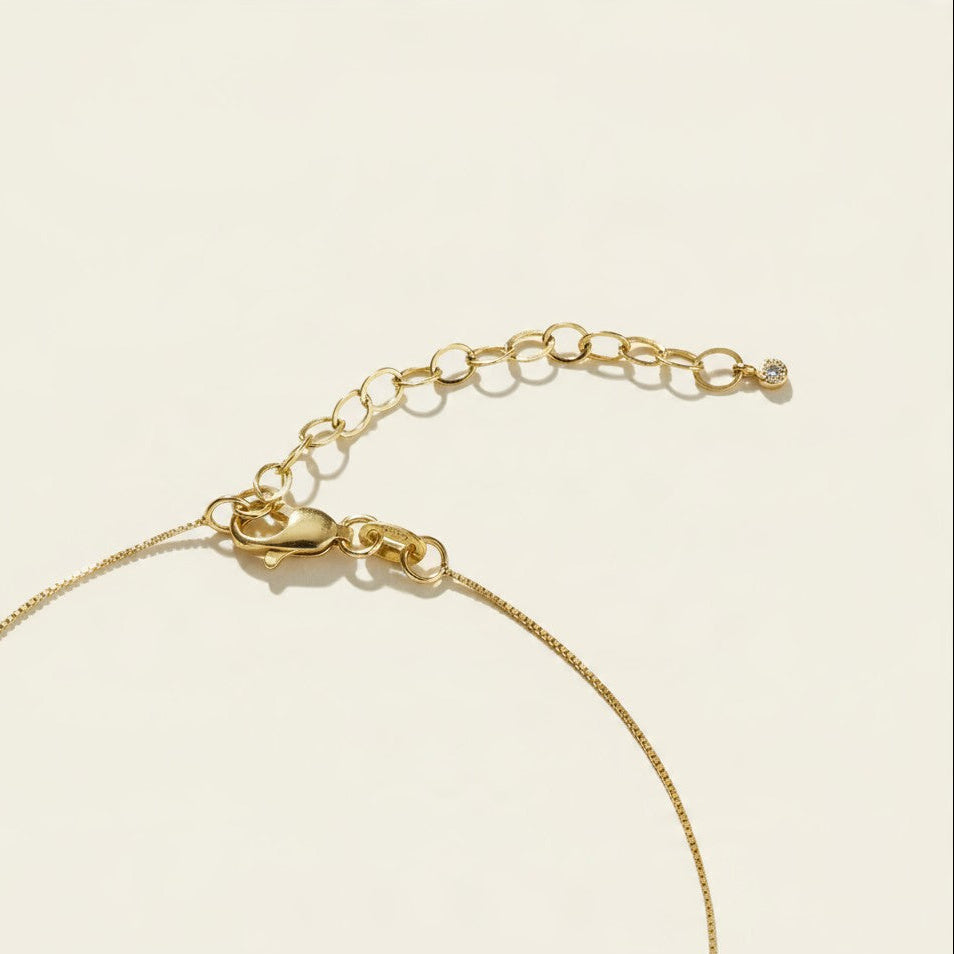 gold tag pendant necklace, rectangle pendant necklace, gold bar pendant necklace, minimalist pendant necklace, box chain necklace, small crystal pendant necklace, dainty gold necklace, gold-tone layering necklace, personalized pendant necklace, engravable pendant necklace, everyday gold necklace, gift for her jewelry