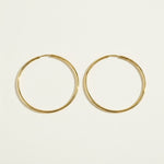 thin gold hoop earrings, endless hoop earrings, large gold hoops, thin wire hoop earrings, classic gold hoops, lightweight hoop earrings, simple gold hoops, everyday gold hoops, minimalist hoops, sleeper hoops, polished gold hoops, hoop size guide, gift for her