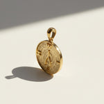 gold wishbone pendant, compass coin necklace charm, medallion pendant gold, symbolic jewelry, vintage coin pendant, textured gold pendant, lucky charm necklace, layering pendant