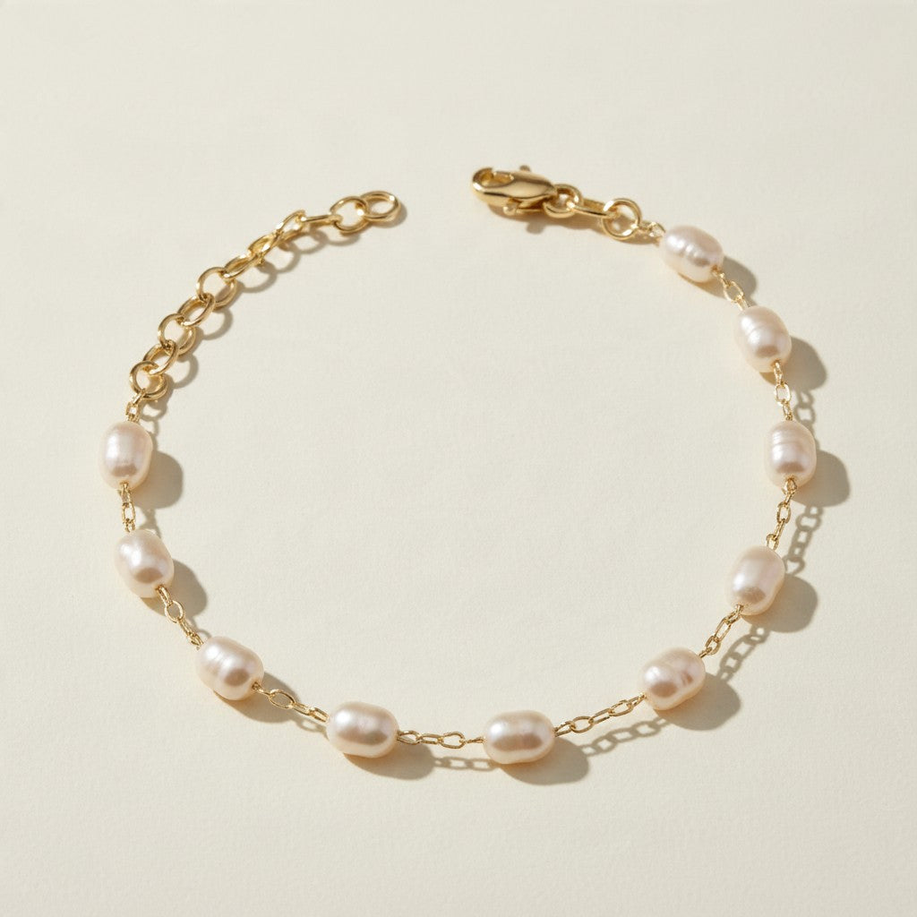 pearl station bracelet, wire wrapped pearl bracelet, oval pearl bracelet, gold and pearl bracelet, dainty pearl bracelet, adjustable pearl bracelet, rice pearl bracelet, lobster clasp pearl bracelet, bridal pearl bracelet, everyday pearl bracelet, layering bracelet, women’s pearl bracelet