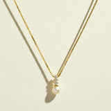 pearl pendant necklace, pearl drop necklace, gold box chain necklace, pearl and crystal necklace, dainty pearl necklace, bridal pearl necklace, classic pearl pendant, gold chain pearl necklace, cubic zirconia pearl pendant, elegant pearl necklace, wedding necklace, women’s pearl pendant necklace