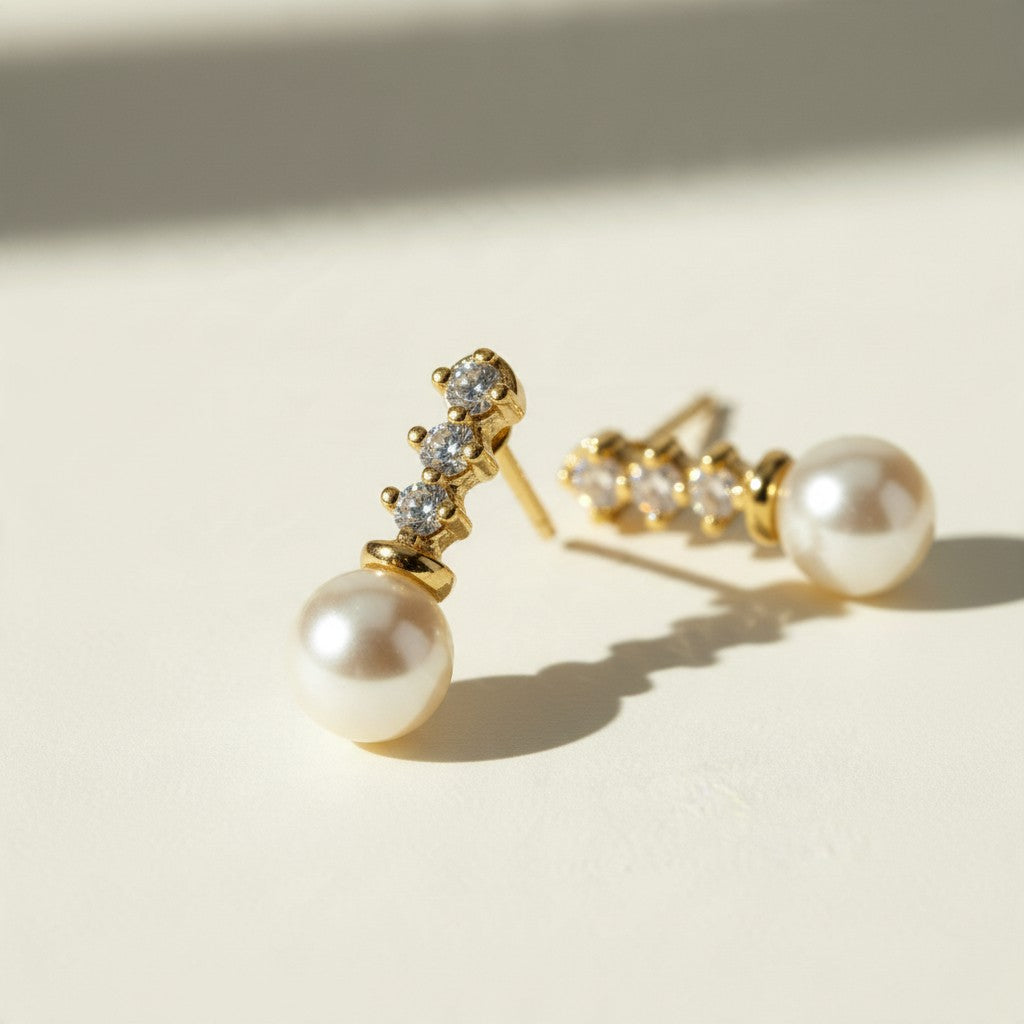 pearl drop earrings, gold pearl and crystal earrings, bridal pearl earrings, pearl stud drop earrings, dainty pearl earrings, classic pearl earrings, cubic zirconia pearl earrings, wedding earrings, elegant pearl earrings, matching necklace and earring set, gift pearl earrings, women’s pearl drop earrings