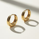 chunky gold huggie hoops, gold dome hoop earrings, thick gold huggie earrings, small gold hoop earrings, hinged hoop earrings, snap closure hoops, polished gold hoops, everyday gold earrings, minimalist hoop earrings, classic gold huggies, lightweight chunky hoops, gift for her