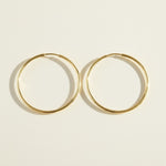 thin gold hoop earrings, endless hoop earrings, large gold hoops, thin wire hoop earrings, classic gold hoops, lightweight hoop earrings, simple gold hoops, everyday gold hoops, minimalist hoops, sleeper hoops, polished gold hoops, hoop size guide, gift for her