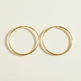 thin gold hoop earrings, endless hoop earrings, large gold hoops, thin wire hoop earrings, classic gold hoops, lightweight hoop earrings, simple gold hoops, everyday gold hoops, minimalist hoops, sleeper hoops, polished gold hoops, hoop size guide, gift for her