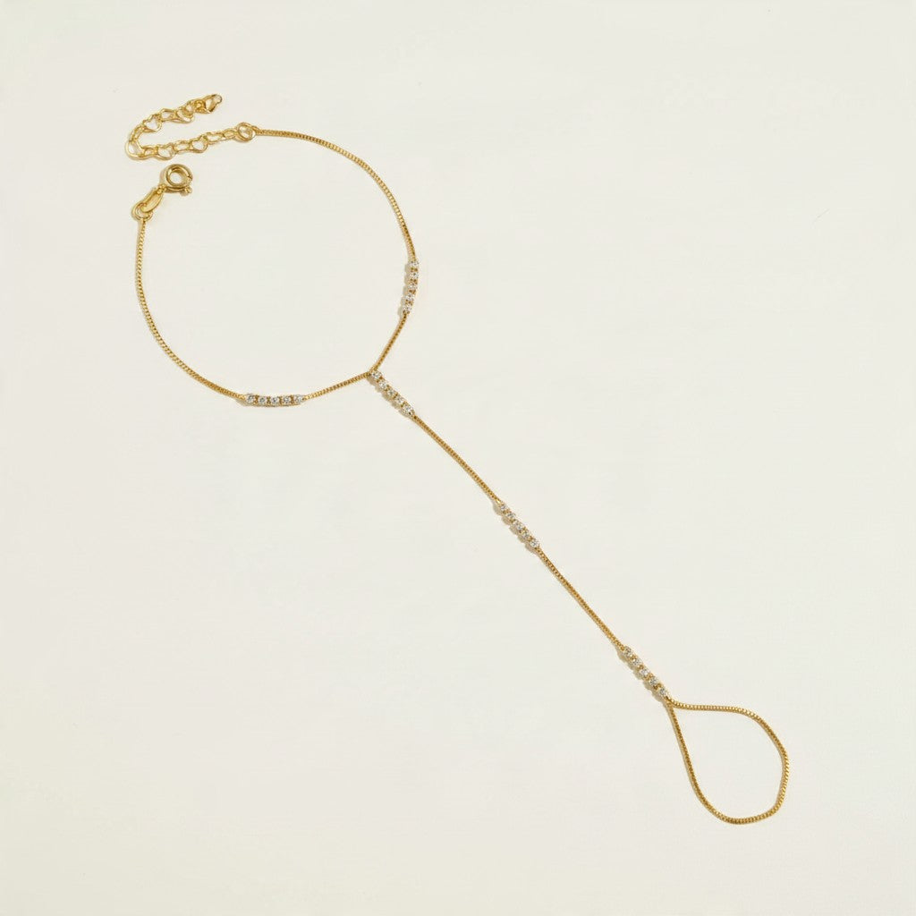 gold hand chain bracelet, slave bracelet, finger ring bracelet, hand harness jewelry, crystal hand chain, bridal hand chain, bracelet with ring attached, dainty gold hand chain, box chain bracelet with crystals, heart extender bracelet, party hand jewelry, women’s hand chain