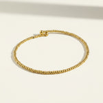 gold beaded stretch bracelet, gold bead bracelet, stretch bracelet gold, minimalist beaded bracelet, stackable gold bracelet, dainty gold bead bracelet, no clasp bracelet, layering bracelet flat lay