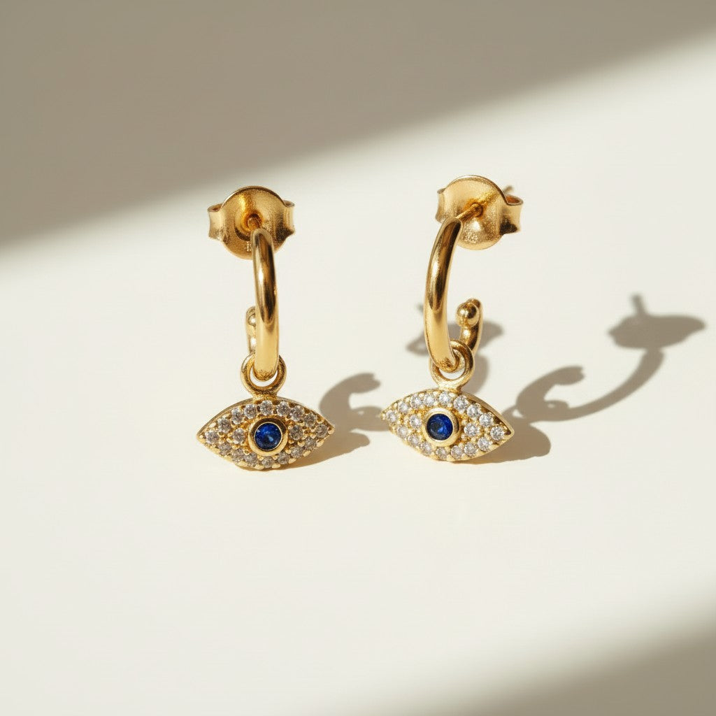 evil eye hoop earrings, gold evil eye charm earrings, 18k gold overlay hoops, pave cubic zirconia earrings, Donna Italiana jewelry, hypoallergenic gold earrings, waterproof gold jewelry, small gold hoop earrings, dainty charm hoops