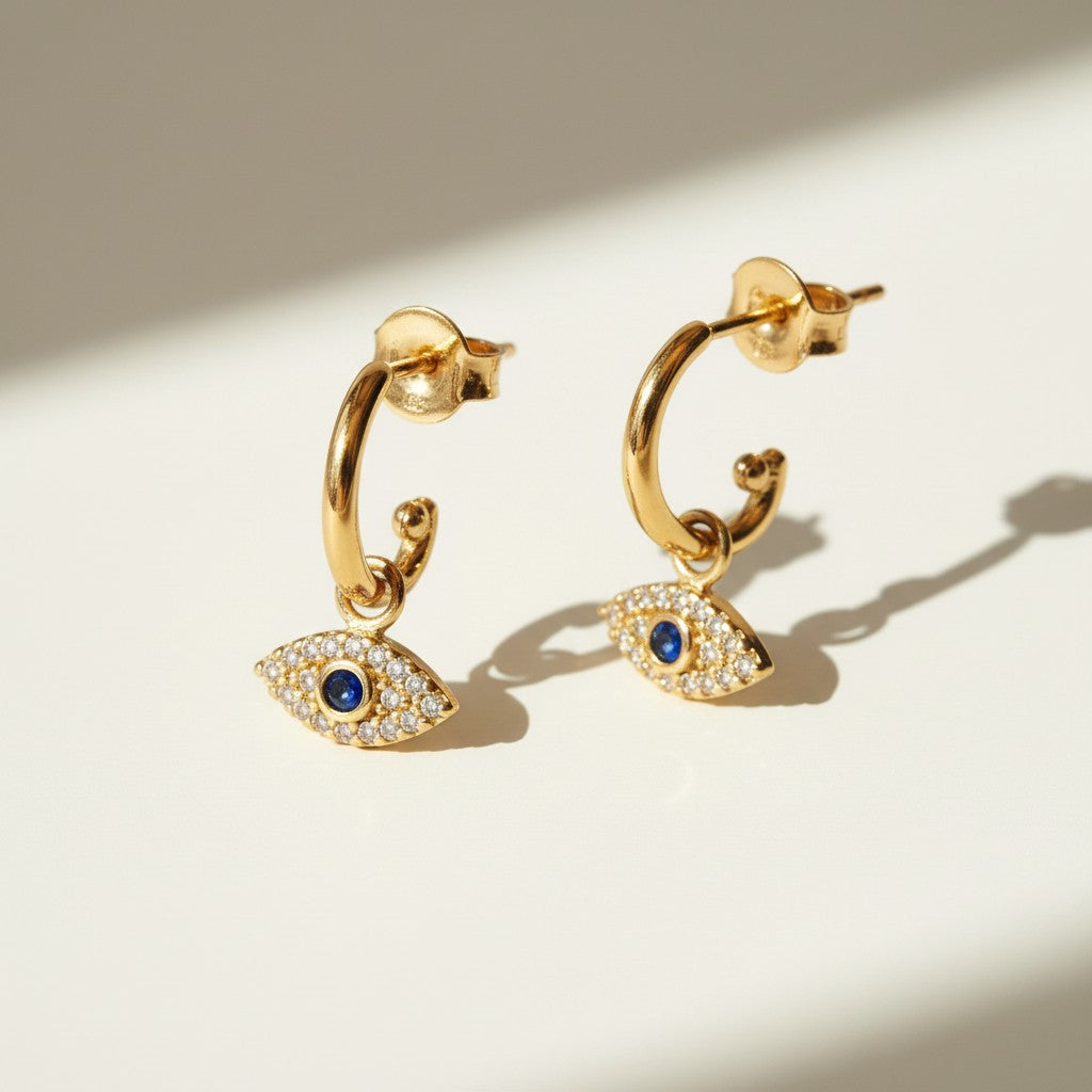 evil eye hoop earrings, gold evil eye charm earrings, 18k gold overlay hoops, pave cubic zirconia earrings, Donna Italiana jewelry, hypoallergenic gold earrings, waterproof gold jewelry, small gold hoop earrings, dainty charm hoops
