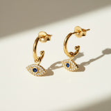 evil eye hoop earrings, gold evil eye charm earrings, 18k gold overlay hoops, pave cubic zirconia earrings, Donna Italiana jewelry, hypoallergenic gold earrings, waterproof gold jewelry, small gold hoop earrings, dainty charm hoops