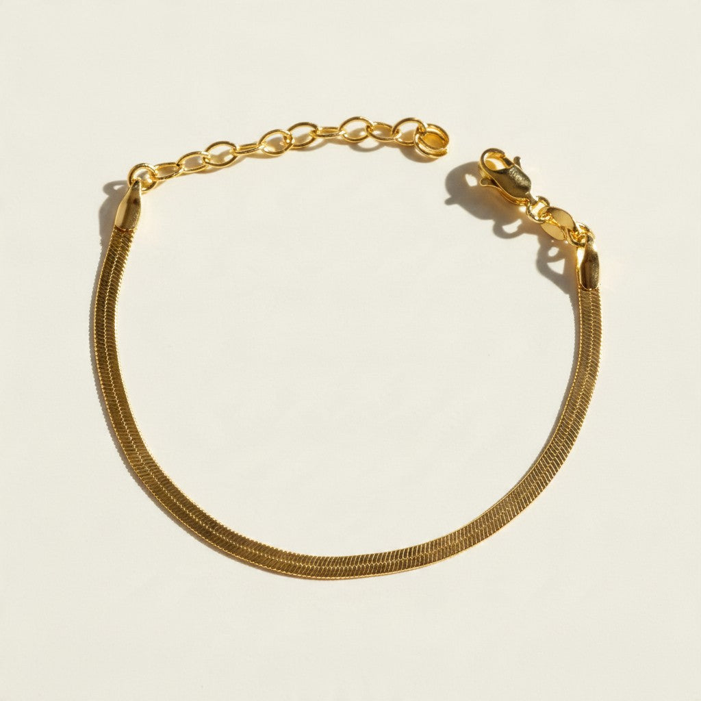 gold herringbone bracelet, flat gold chain bracelet, gold snake chain bracelet, adjustable gold bracelet, lobster clasp bracelet with extender, dainty gold bracelet, minimalist gold bracelet, layering bracelet, everyday gold bracelet, slim herringbone bracelet, shiny gold chain bracelet, women’s gold bracelet