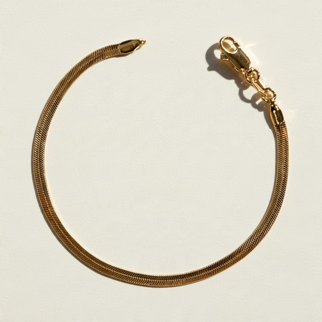 gold herringbone bracelet, flat gold chain bracelet, gold snake chain bracelet, adjustable gold bracelet, lobster clasp bracelet with extender, dainty gold bracelet, minimalist gold bracelet, layering bracelet, everyday gold bracelet, slim herringbone bracelet, shiny gold chain bracelet, women’s gold bracelet