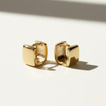square huggie earrings, chunky gold huggie hoops, geometric hoop earrings, boxy gold hoops, small gold hoop earrings, polished gold huggies, hinged huggie hoops, everyday gold hoops