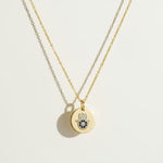 hamsa pendant necklace, gold coin necklace, hamsa coin pendant, blue crystal hamsa necklace, dainty gold pendant, protective charm necklace, round disc pendant necklace, hamsa necklace detail