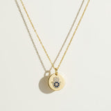 hamsa pendant necklace, gold coin necklace, hamsa coin pendant, blue crystal hamsa necklace, dainty gold pendant, protective charm necklace, round disc pendant necklace, hamsa necklace detail