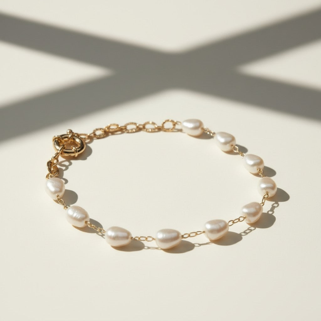 baroque pearl bracelet flat lay, freshwater pearl bracelet, gold chain pearl bracelet, adjustable pearl bracelet clasp, handcrafted baroque pearl jewelry, pearl and gold chain bracelet, statement clasp pearl bracelet, organic pearl bracelet detail