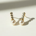 pearl drop earrings, gold pearl and crystal earrings, bridal pearl earrings, pearl stud drop earrings, dainty pearl earrings, classic pearl earrings, cubic zirconia pearl earrings, wedding earrings, elegant pearl earrings, matching necklace and earring set, gift pearl earrings, women’s pearl drop earrings