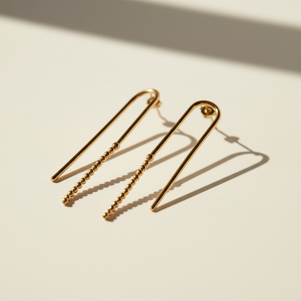 arch drop earrings, beaded wire earrings, gold U-shaped earrings, minimalist drop earrings, linear gold earrings, long wire earrings, geometric drop earrings, stud post drop earrings